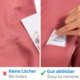 Zwei Etiketten auf einem rosa Stoff. Links steht "Keine Löcher", rechts "Gut ablösbar" mit einem ablösbaren Namensschild.