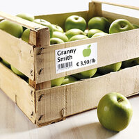 Immagine di applicazione etichetta di potenza su cassa di mele